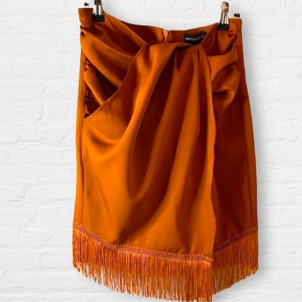 𝅺pretty little thing wrap fringe mini skirt size 4 twist front